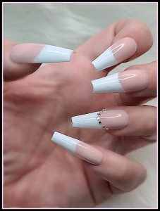 The French Twist, Featuring a Classical French Manicure with a Gemmed Smile Line on the Ring Finger